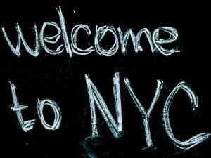 black background with welcome to nyc text overlay