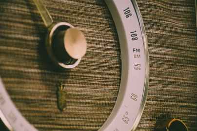 round white and gray lens on brown textile
